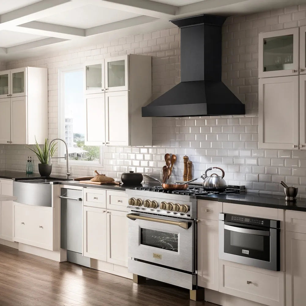 Farmhouse kitchen with white cabinets, black stove, and ZLINE Autograph Edition 36 in. 4.6 cu. ft. Legacy Dual Fuel Range with 6 Burner Gas Cooktop and Electric Convection Oven in Satin Stainless Steel and Champagne Bronze Accents (RASZ-SN-36-CB)