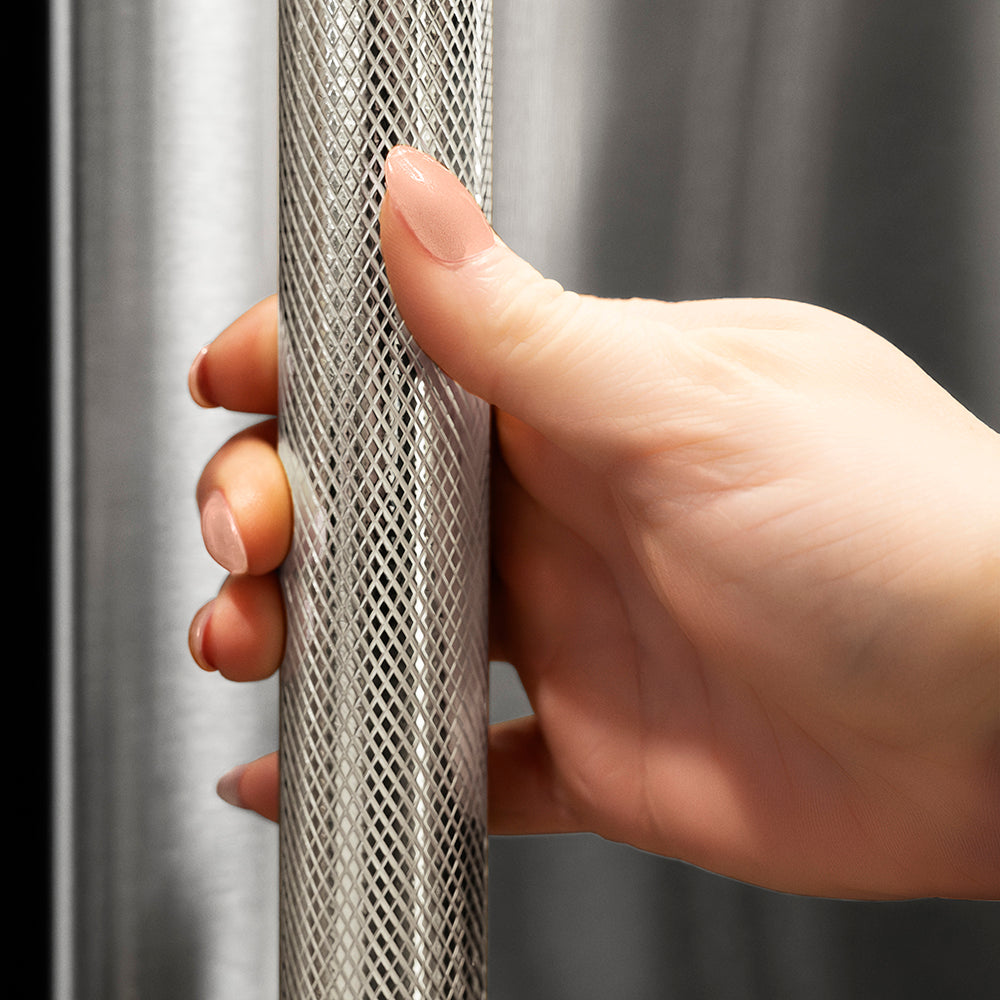 ZLINE Autograph Edition 36 in. 21.6 cu. ft. Counter-Depth French Door Refrigerator with Water and Ice Dispenser in Fingerprint-Resistant Stainless Steel with Polished Nickel Helix Handles (RFMZ-W-36-KPN) hand holding Helix handle showing knurled diamond texture.