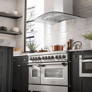 ZLINE 48 in. CrownSound™ Ducted Vent Wall Mount Range Hood in Stainless Steel with Built-in Bluetooth Speakers (KN4CRN-BT-48) in a luxury kitchen.