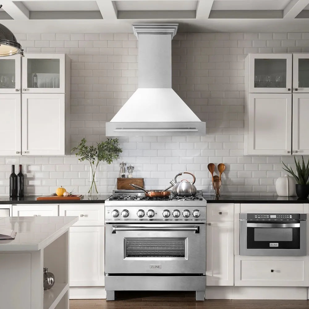 ZLINE 36 in. Satin Stainless Steel Wall Mount Range Hood with White Matte Shell and Stainless Steel Handle (8654SNX-WM-36) in a luxury kitchen.