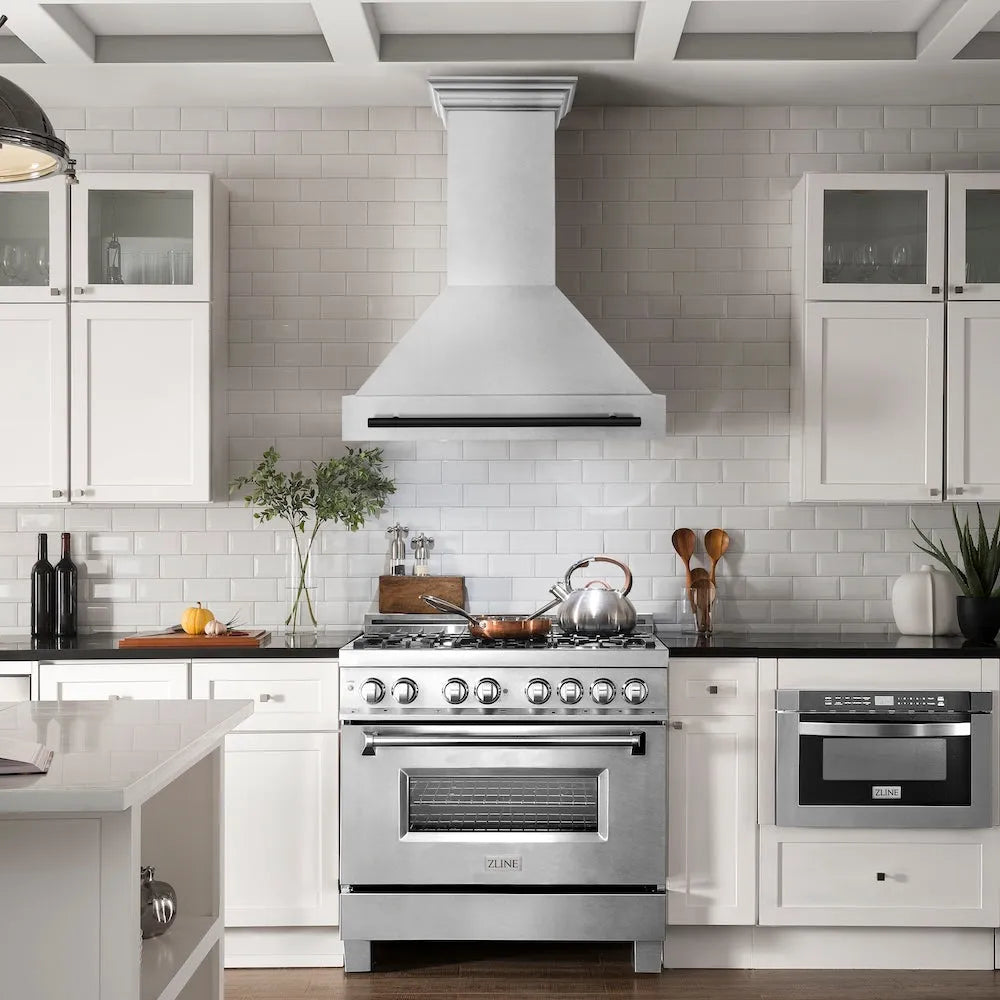 Modern farmhouse kitchen with stainless steel range and ZLINE Autograph Edition 36 in. Satin Stainless Steel Wall Mount Range Hood with Matte Black Handle (8654SNZ-36-MB)