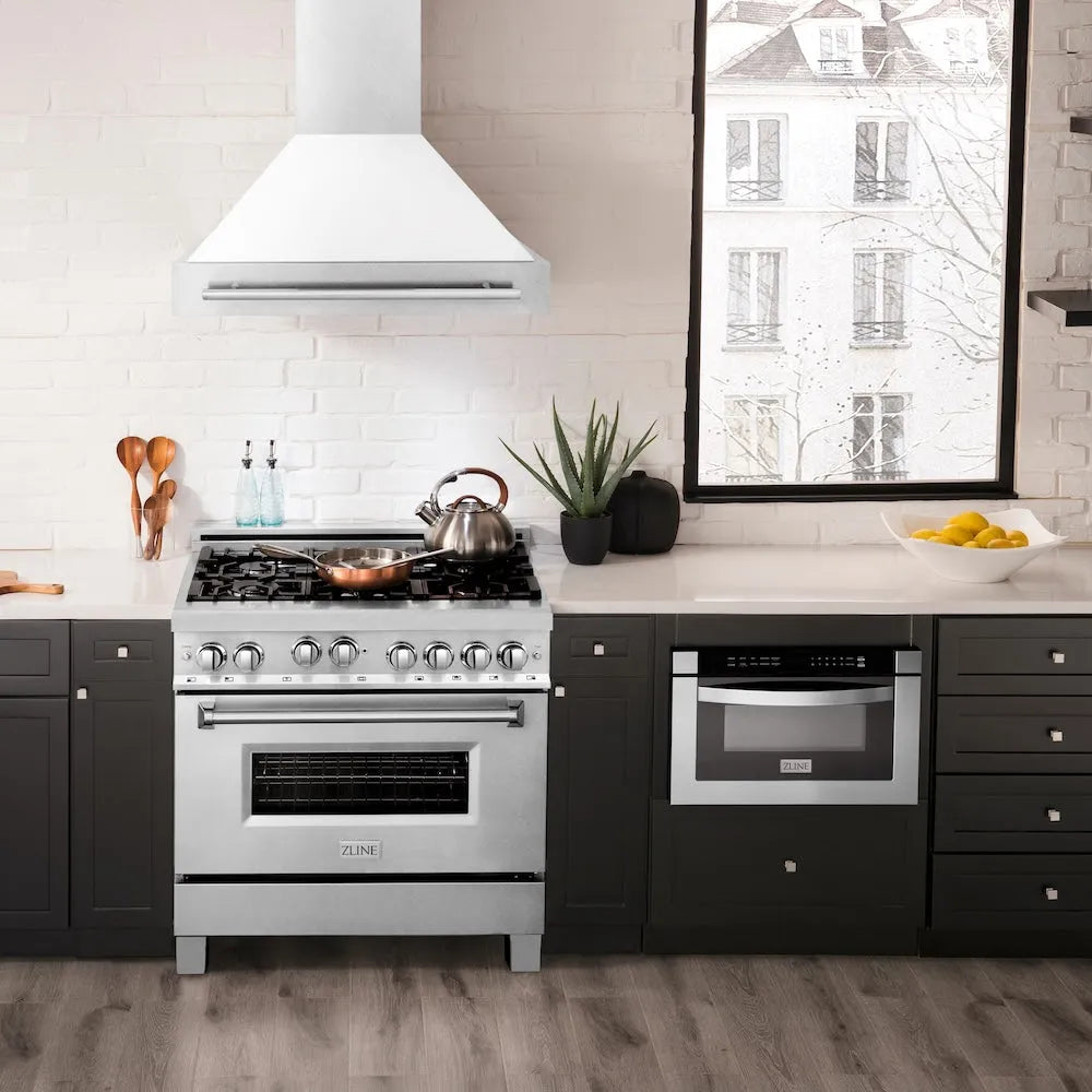 ZLINE 36 in. Satin Stainless Steel Wall Mount Range Hood with White Matte Shell and Stainless Steel Handle (8654SNX-WM-36) in a luxury kitchen.