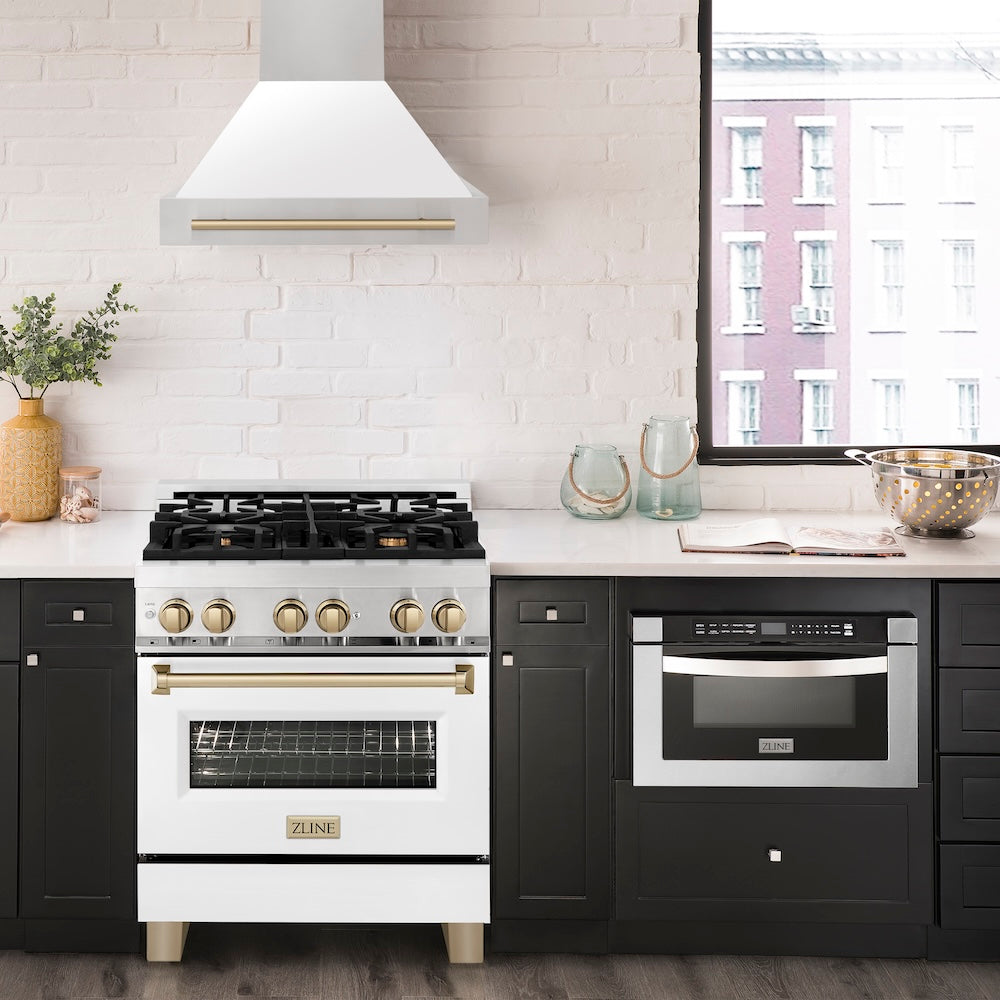 ZLINE Autograph Edition 30 in. Stainless Steel Range Hood with White Matte Shell and Champagne Bronze Handle in a luxury kitchen.