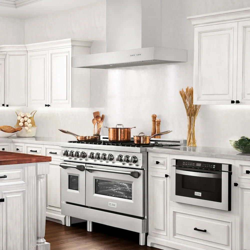 ZLINE 48 in. Ducted Professional Wall Mount Range Hood in Stainless Steel (KECOM-48) side, in a luxury kitchen.