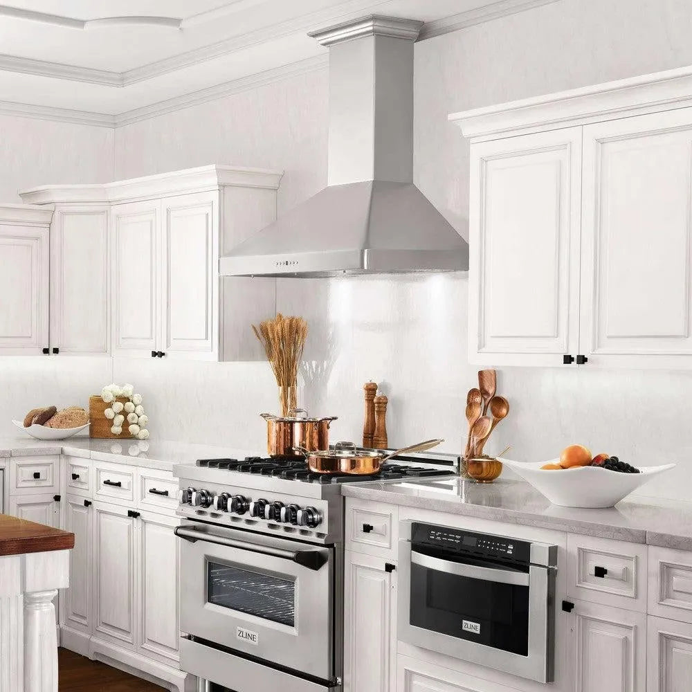 ZLINE 36 in. CrownSound™ Ducted Vent Wall Mount Range Hood in Stainless Steel with Built-in Bluetooth Speakers (KF2CRN-BT-36) in a luxury kitchen.