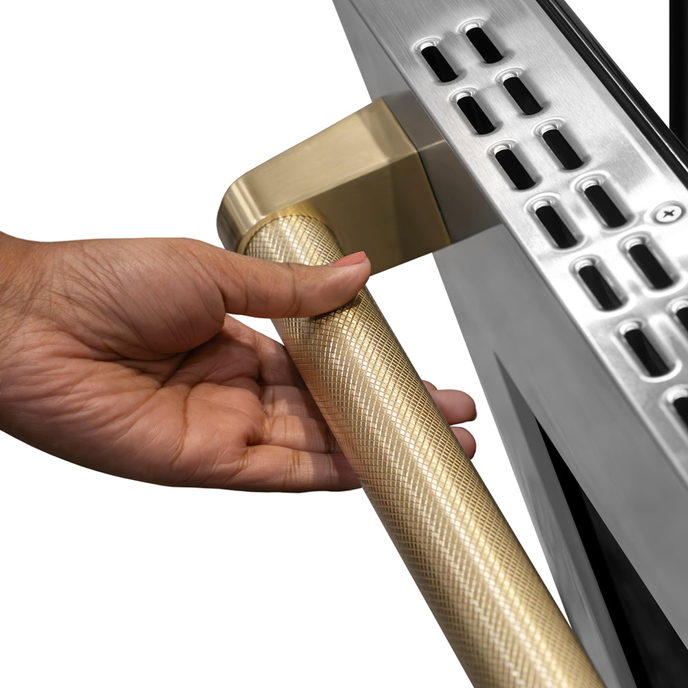 ZLINE Autograph Edition 36 in. 5.2 cu. ft. Paramount Dual Fuel Range with 6 Burner DuoPro™ Cooktop and Electric Convection Oven in Stainless Steel with Champagne Bronze Helix Handle and Accents (PSDRZ-36-KCB) hand holding Helix handle showing knurled diamond texture.