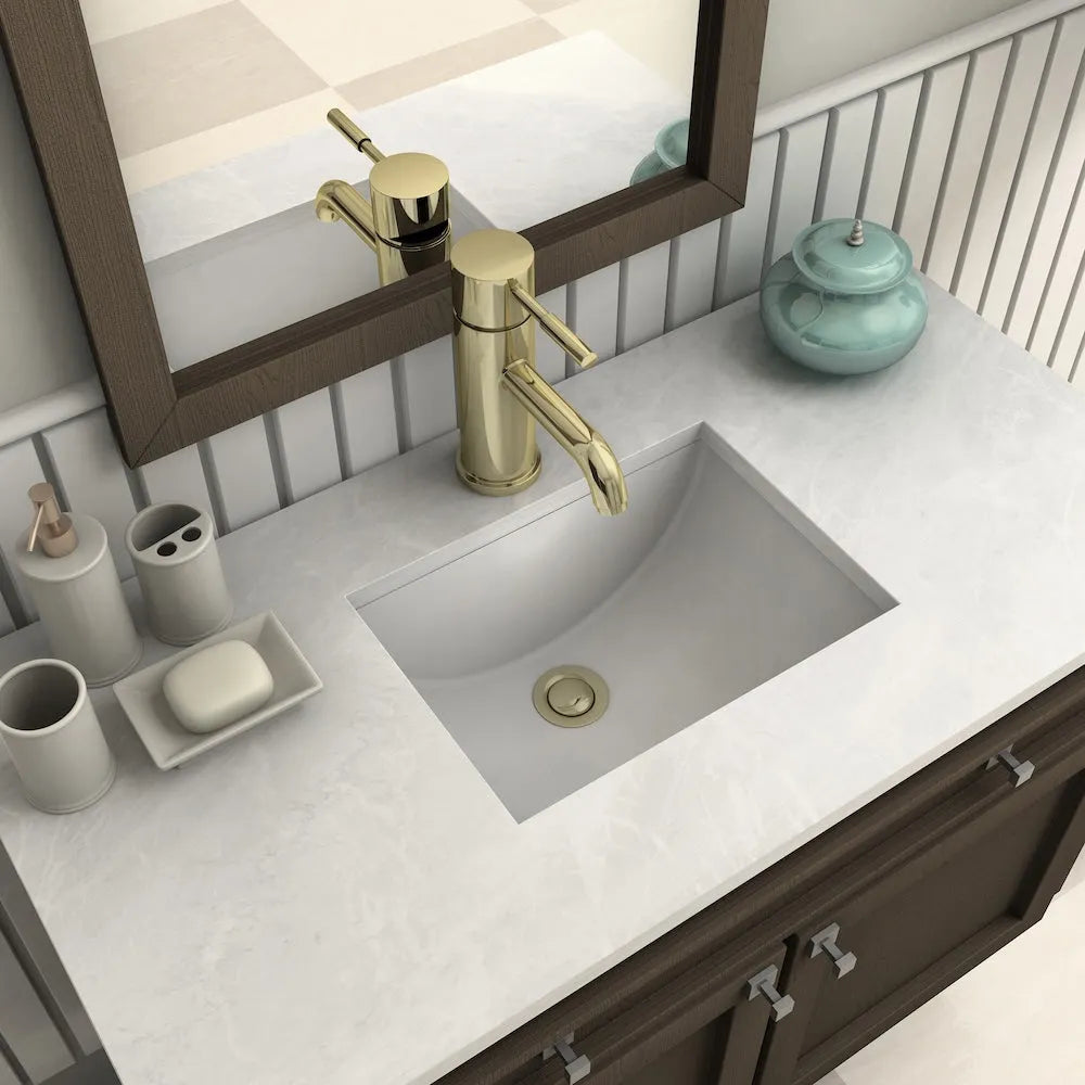 ZLINE Autograph Edition Aloha Single Handle Bath Faucet in Polished Gold (ALH-BF-PG) on a bathroom vanity with mirror and toiletries.