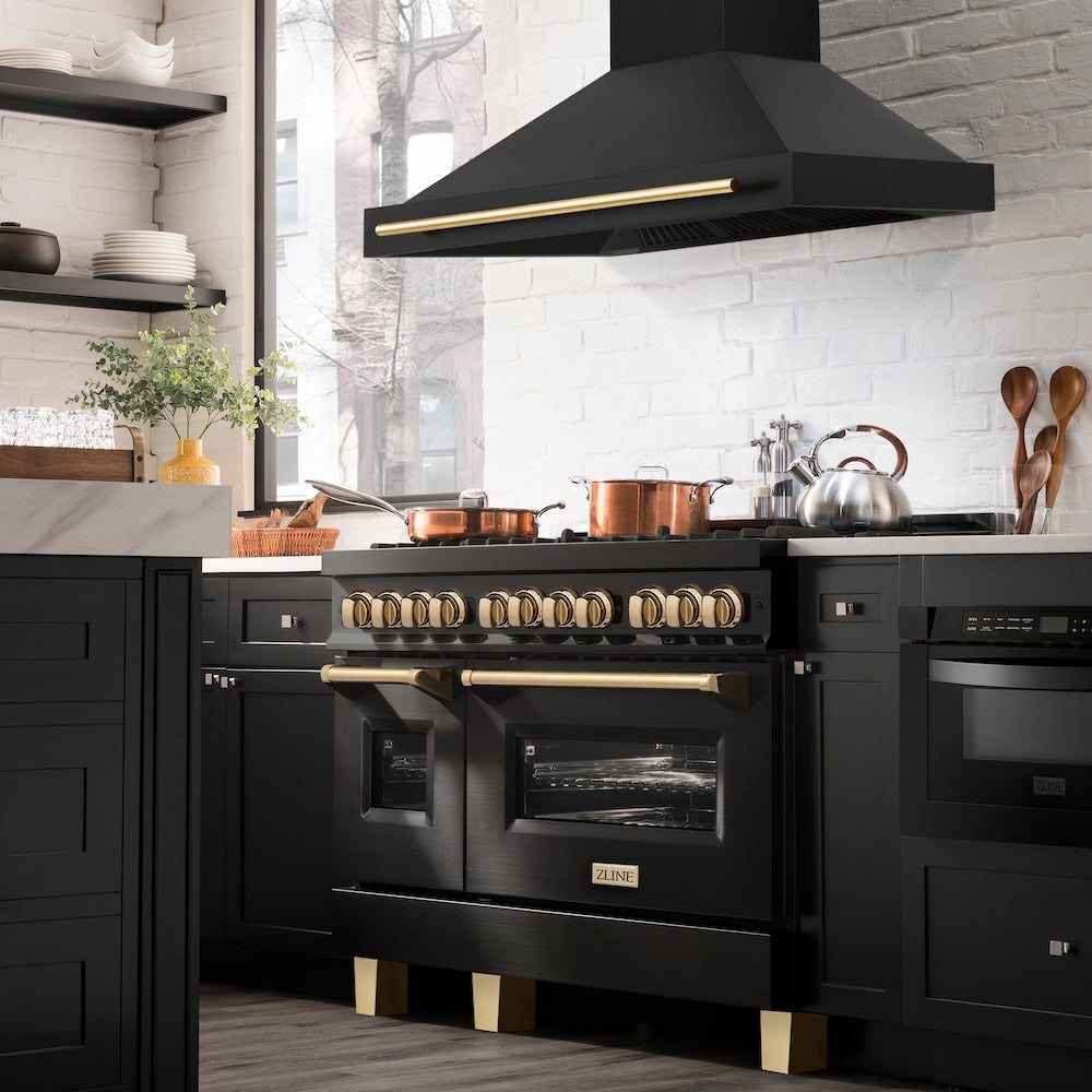 ZLINE 48 in. Black Stainless Steel Range Hood with Polished Gold Handle (BS655Z-48-G) in a luxury kitchen.