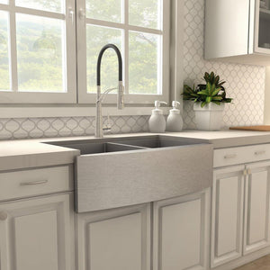 ZLINE Da Vinci Kitchen Faucet in Brushed Nickel (DAV-KF-BN) in a farmhouse kitchen, side.