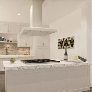 Cottage kitchen with ZLINE 36 in. Convertible Vent Wooden Island Mount Range Hood in Cottage White (KBiTT-36), marble countertop, cooktop, and decorative wall art.