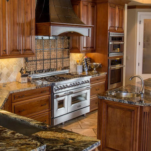 Rustic kitchen with stainless steel appliances, wooden cabinets, and a large rustic custom range hood using a ZLINE 46 in. Ducted Wall Mount Range Hood Insert in Stainless Steel (698-46).