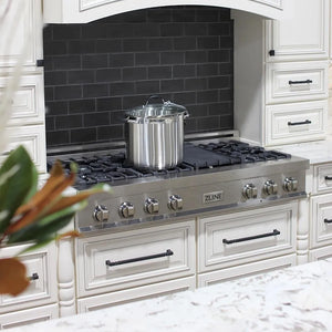 ZLINE 48 in. Legacy Gas Rangetop with 7 Burners and Porcelain Cooktop in Satin Stainless Steel (RTS-48) in a kitchen with black tiled backsplash and white cabinets.