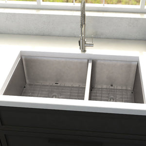 ZLINE Chamonix 36 in. Undermount Double Bowl Stainless Steel Kitchen Sink with Bottom Grid (SR60D-36) in a cottage-style kitchen, close-up.