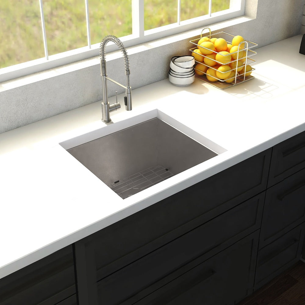 ZLINE Meribel 23 in. Undermount Single Bowl Stainless Steel Kitchen Sink with Bottom Grid (SRS-23) in a farmhouse-style kitchen, above.