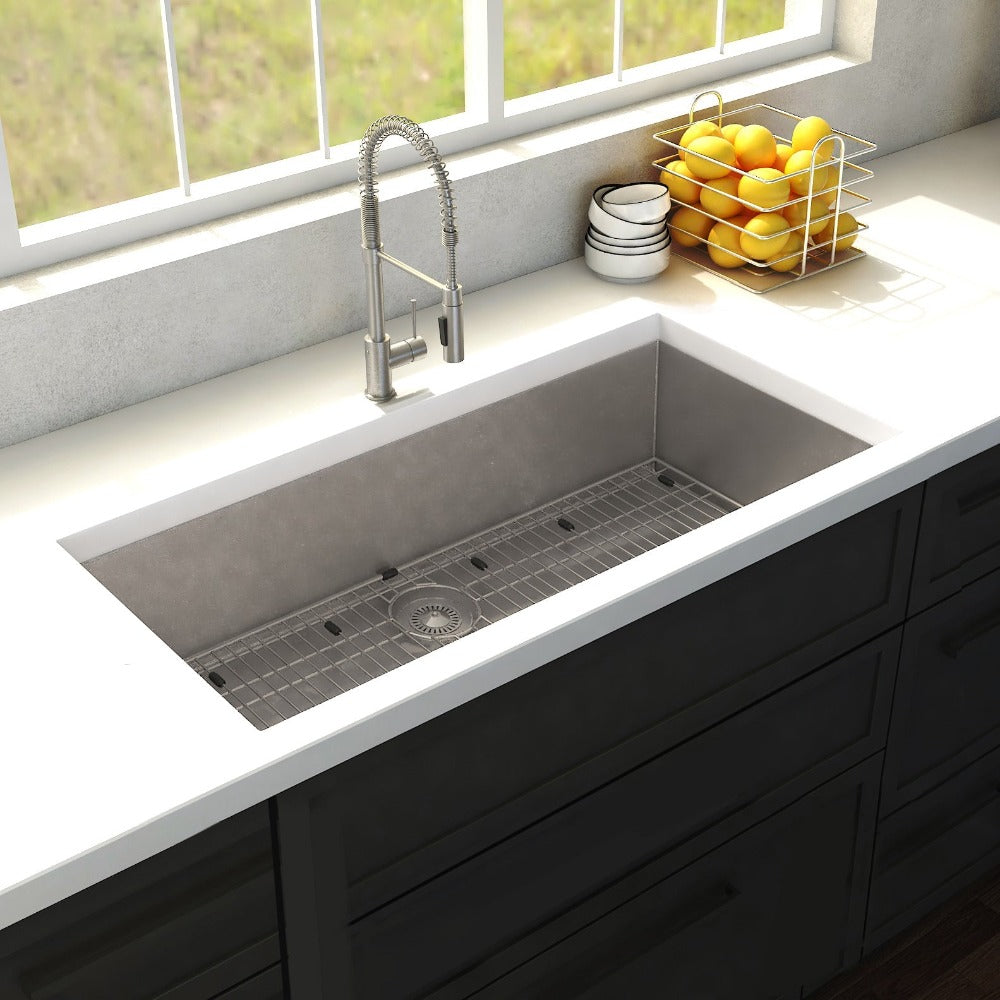 ZLINE Meribel 33 in. Undermount Single Bowl Stainless Steel Kitchen Sink with Bottom Grid (SRS-33) in a farmhouse-style kitchen, above.