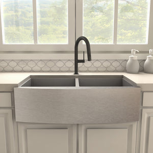 ZLINE Voltaire Pull Down Single Handle Kitchen Faucet in Matte Black (VLT-KF-MB) above a farmhouse sink in a kitchen setting