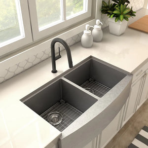 ZLINE Voltaire Pull Down Single Handle Kitchen Faucet in Matte Black (VLT-KF-MB) above a kitchen sink with window in background