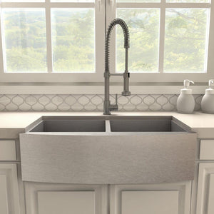 ZLINE Apollo Pull Down Spring Single Handle Kitchen Faucet in Gun Metal (APL-KF-GM) in a farmhouse kitchen, front.
