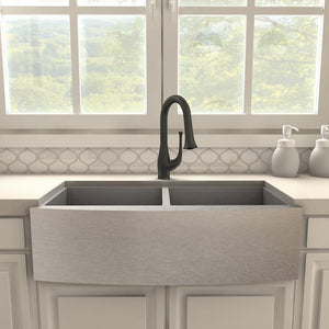 ZLINE Shakespeare Pull Down Kitchen Faucet in Matte Black (SHK-KF-MB) in a farmhouse kitchen, front.