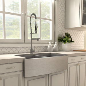 ZLINE Van Gogh Pull Down Spring Kitchen Faucet with Pot Filler in Gun Metal (VNG-KF-GM) in a farmhouse kitchen, side.