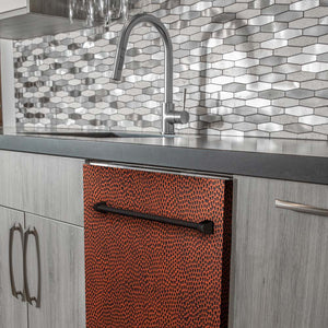 ZLINE 24 in. Top Control Dishwasher with Hand-Hammered Copper Panel and Traditional Style Handle, 52dBa (DW-HH-H-24) built-in to modern grey cabinets in a luxury kitchen.