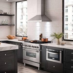 ZLINE Convertible Vent Wall Mount Range Hood in Stainless Steel (KB) in a modern apartment kitchen.