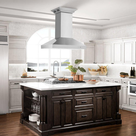 ZLINE Island Mount Range Hood in Stainless Steel with Built-in ZLINE CrownSound Bluetooth Speakers (KL3iCRN-BT) in a luxury compact kitchen with matching range and microwave, front.