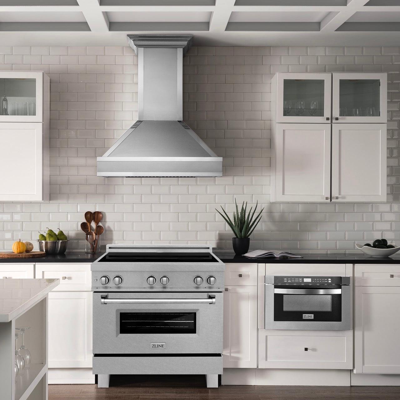 ZLINE 36 in. Induction Range in Fingerprint Resistant Stainless Steel (RAINDS-SN-36) in Rustic Farmhouse Kitchen with white cabinetry and backsplash with matching ZLINE Range Hood