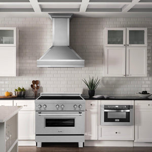 ZLINE 36 in. Induction Range in Fingerprint Resistant Stainless Steel (RAINDS-SN-36) in Rustic Farmhouse Kitchen with white cabinetry and backsplash with matching ZLINE Range Hood