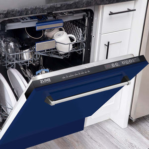 ZLINE 24 in. Tallac Series 3rd Rack Dishwasher with Blue Gloss Panel and Traditional Handle, 51dBa (DWV-BG-24) half open with dishes inside in a kitchen with white cabinets and stone countertops.