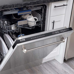 ZLINE 24 in. Tallac Series 3rd Rack Dishwasher with Fingerprint Resistant Stainless Steel Panel and Traditional Handle 51dBa (DWV-SN-24) half open with dishes inside in a kitchen with white cabinets and stone countertops.