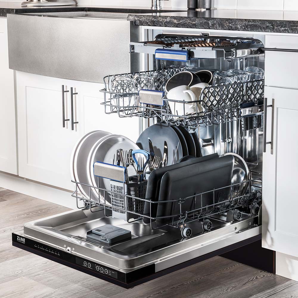 ZLINE 24 in. Tallac Series 3rd Rack Dishwasher with Oil-Rubbed Bronze Panel and Traditional Handle, 51dBa (DWV-ORB-24) side, open, in a luxury kitchen with dishes loaded on racks.