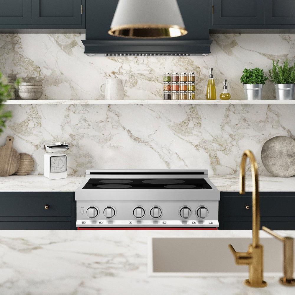ZLINE 30 in. 4.0 cu. ft. Induction Range with a 4 Induction Element Stove and Electric Oven in Stainless Steel with Red Gloss Door (RAIND-RG-30) in a luxury kitchen with white marble backsplash.