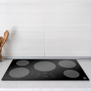 ZLINE 36 in. Induction Cooktop with 5 burners (RCIND-36) built-in to a countertop in a white kitchen.
