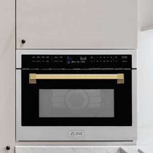 ZLINE Autograph Edition 24 in. 1.6 cu ft. Built-in Convection Microwave Oven in Stainless Steel with Polished Gold Accents (MWOZ-24-G) built-in to white kitchen wall.