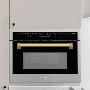 ZLINE Autograph Edition 24 in. 1.6 cu ft. Built-in Convection Microwave Oven in DuraSnow Stainless Steel with Polished Gold Accents built-in to white kitchen wall.