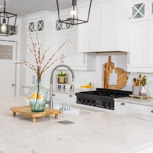 ZLINE 36 in. Legacy Gas Rangetop with 6 Brass Burners and Porcelain Cooktop in Black Stainless Steel (RTB-BR-36) lifestyle, in a luxury kitchen.