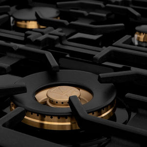 ZLINE 60 in. 7.4 cu. ft. Legacy Dual Fuel Range with 9 Burner Gas Cooktop and 2 Electric Convection Ovens in Black Stainless Steel (RAB-60) close-up, brass burner and cast-iron grates.