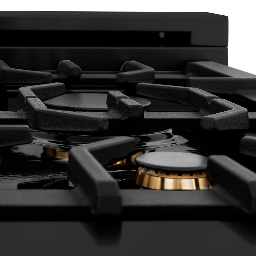Brass burner and cast-iron grates on ZLINE black porcelain cooktop close up.