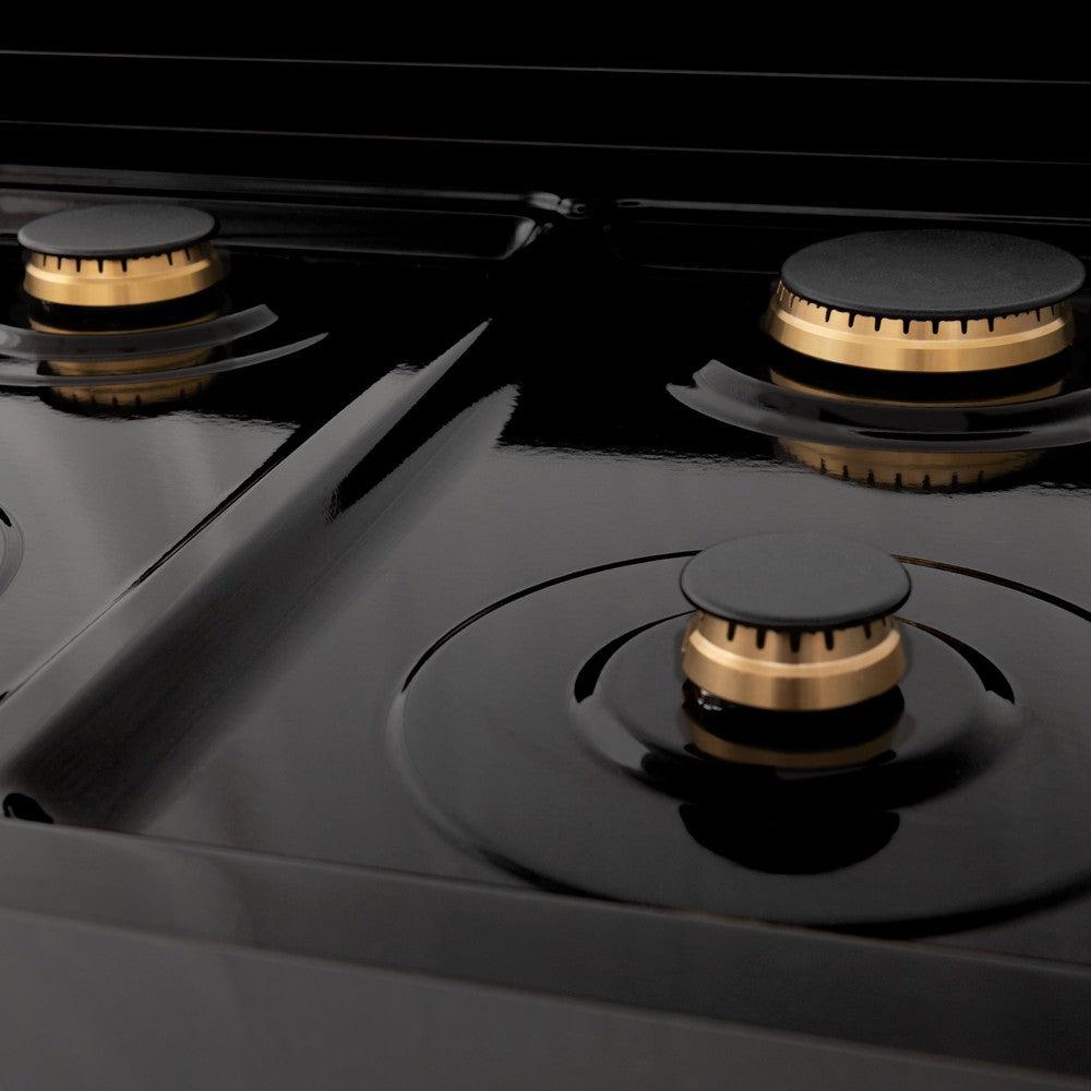 ZLINE brass burners on black porcelain cooktop no grates.