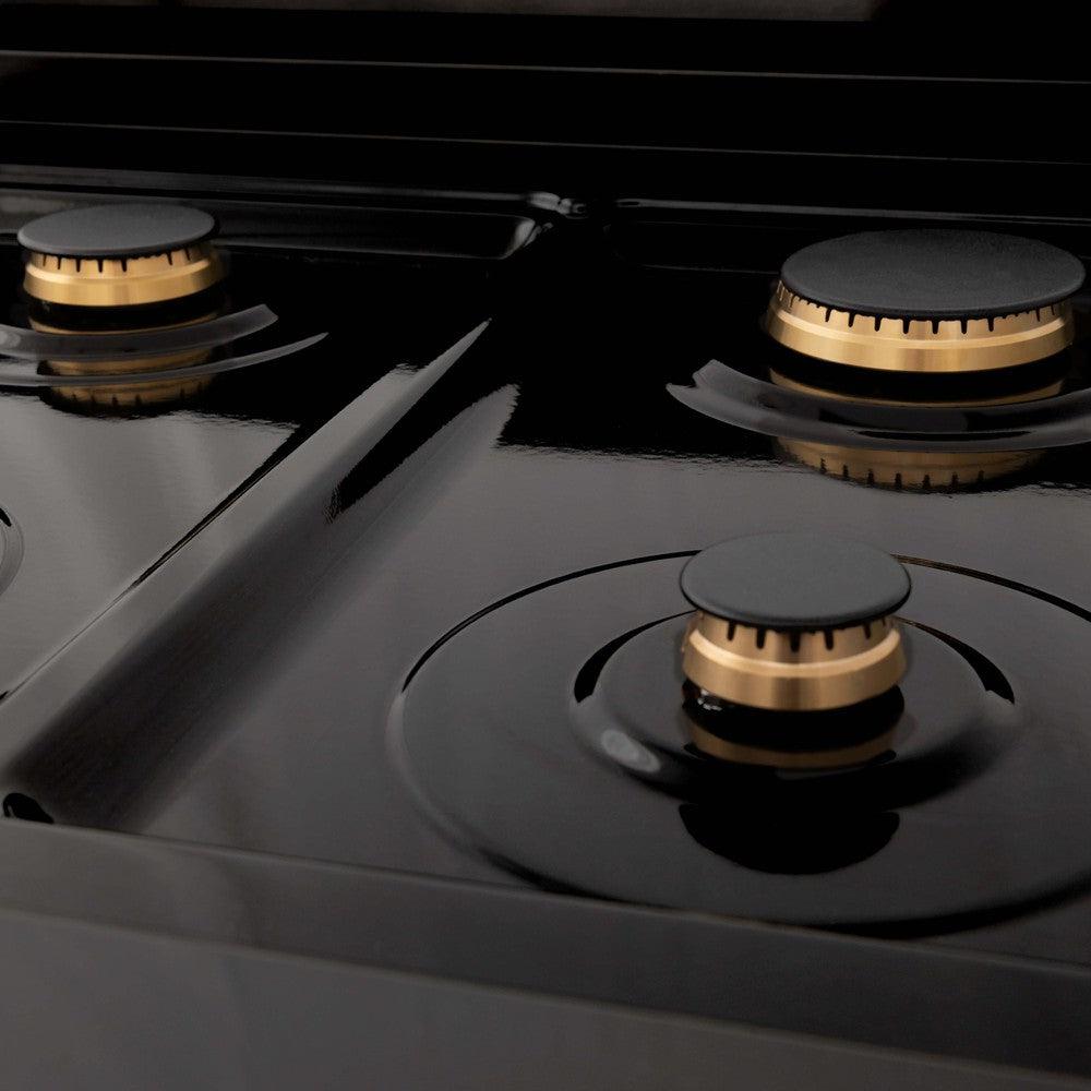 ZLINE Autograph Edition 30 in. 4.0 cu. ft. Dual Fuel Range with Gas Stove and Electric Oven in Black Stainless Steel with Polished Gold Accents (RABZ-30-G) brass burners on black porcelain cooktop without grates.