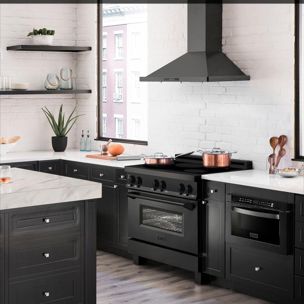 ZLINE 36 in. 4.6 cu. ft. Induction Range with a 4 Element Stove and Electric Oven in Black Stainless Steel (RAIND-BS-36) lifestyle image from side in a luxury kitchen.