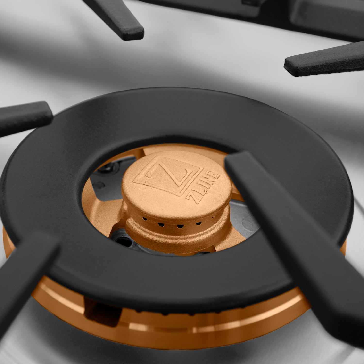 Brass burners and cast-iron grates on ZLINE Drop-in Gas Cooktop.