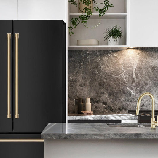 ZLINE Autograph Edition 36 in. 22.5 cu. ft Freestanding French Door Refrigerator with Ice Maker in Fingerprint Resistant Black Stainless Steel with Champagne Bronze Accents (RFMZ-36-BS-CB) in a cottage-style kitchen with other ZLINE appliances close-up.