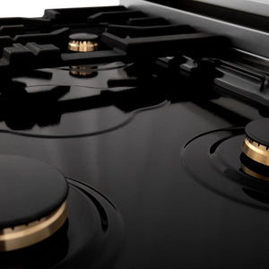 ZLINE brass burners on black porcelain cooktop.