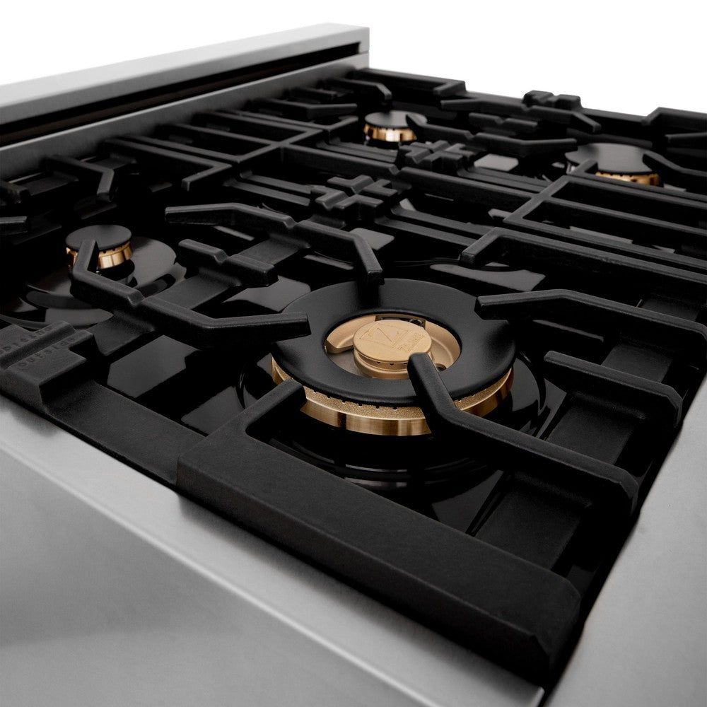 ZLINE brass burners on black porcelain cooktop with cast-iron grates.