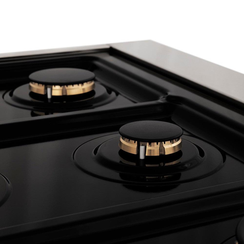 Two ZLINE brass burners on black porcelain cooktop without grates.