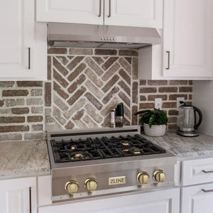 ZLINE Autograph Edition 30 in. Legacy Gas Rangetop with 4 Burners and Porcelain Cooktop in Stainless Steel with Polished Gold Accents (RTZ-30-G) lifestyle, in a luxury kitchen.