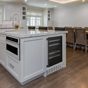 ZLINE Autograph Edition 24 in. Monument Dual Zone 44-Bottle Wine Cooler in Stainless Steel with Matte Black Accents (RWVZ-UD-24-MB) built-in to white kitchen island with marble countertop.