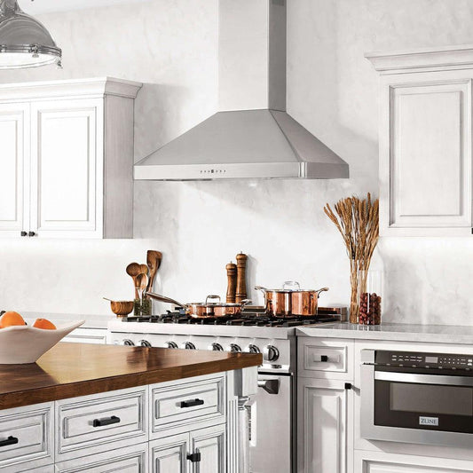 ZLINE Convertible Vent Wall Mount Range Hood in Stainless Steel (KF2) lifestyle, in a farmhouse-style kitchen.